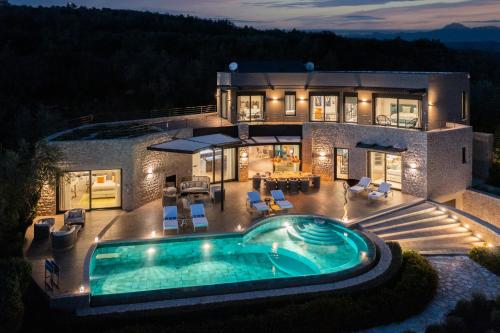 The Olive Retreat Villa pool treehouse sleeps 10 in Tragana