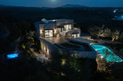 The Olive Retreat Villa pool treehouse sleeps 10 in Tragana
