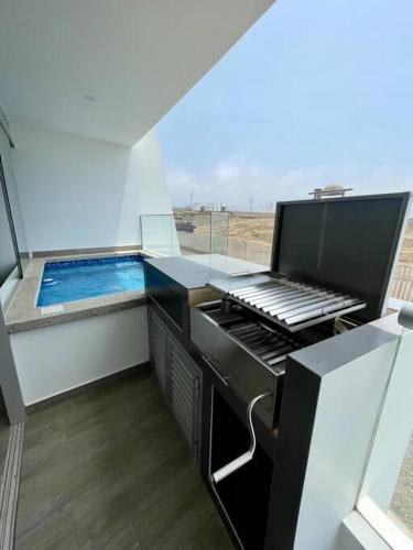 Skats, Moderno Departamento con Piscina y Parrilla, 3 min de la playa, Asia in Asia