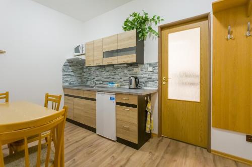 บริการและสิ่งอำนวยความสะดวก, Pension Kraus in ลิโทมิเซล