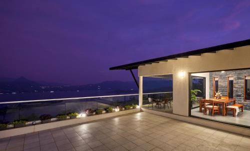 Exterior view, SaffronStays Ahilya Waters - 3BR Pawna villa, infinity pool, 270 terrace views, bonfire & AD-feature in Kolechafesar