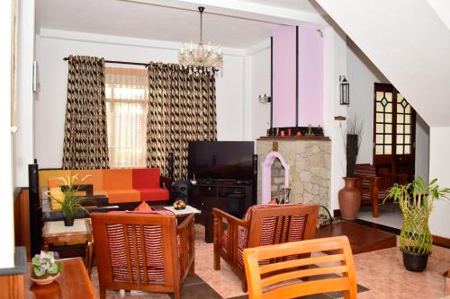 Közös társalgó / TV, Hill Crest Holiday Bungalow in Diyatalawa