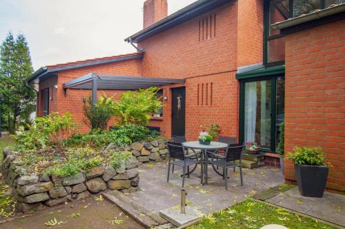 شرفة/ تراس, Architektenhaus am Pewsumer Tief in Krummhorn