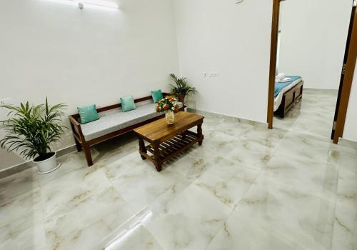 Tirupati Homestay - Shilparamam - Luxury AC apartments by Stayflexi - Fast WiFi, Kitchen, Android TV - Walk to PS4 Pure Veg Restaurant - Easy access to Airport, Railway Station and to all Temples