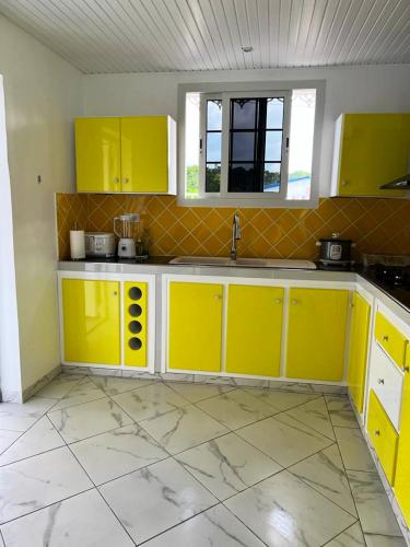 Cocina, Maison charmante au Vauclin avec jardin clôturé. (Maison charmante au Vauclin avec jardin cloture.) in Le Vauclin