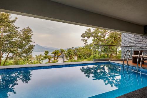 SaffronStays Yahvi Waters by Kosha Villas, Pawna - pool villa with stunning lake view