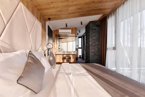 421614138 Hotel Ózon & Luxury Villas