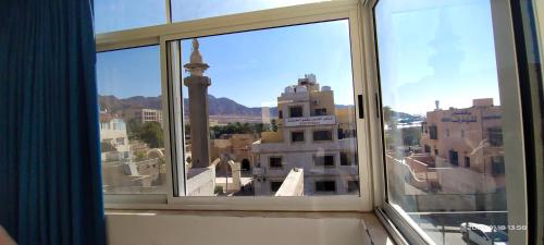 Happy Beach For Studio Rooms Apartment شاطئ السعادة للشقق المفروشة 5