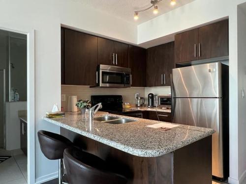 Centrally Located - Spacious 2-Bdrm Condo - Next to Scotiabank Arena