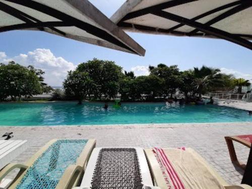 Swimming pool, A sea view 3 bedroom beach vacation home near Repelling Platform