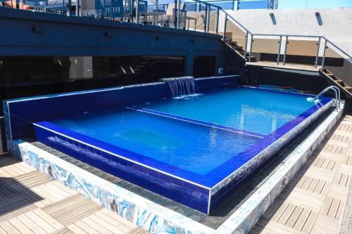 Swimming pool, Bello Monoambiente ZV212, Edif Zetta Village Airport in Mariano Roque Alonso