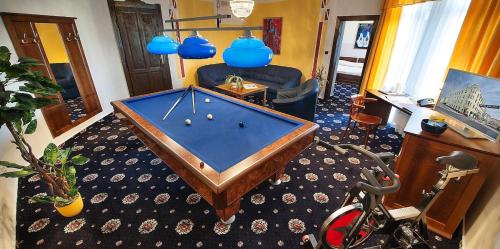 Suite with Balcony and Pool Table