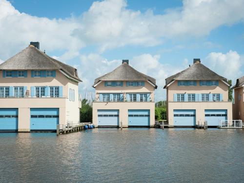  Shiphouse Villa near Stavoren on the water with beautiful view in 8715 HR Stavoren