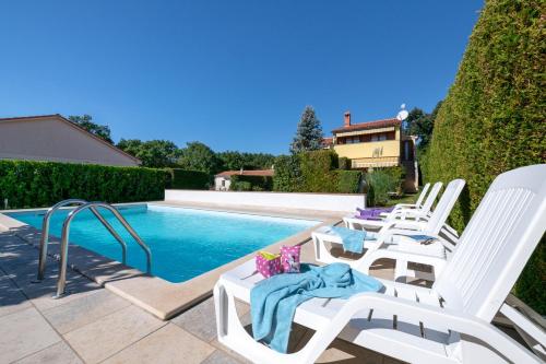 VILLA LIVIA with three nice apartments, swimming pool, childrens playground, barbecue and free parking