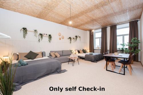 Bali house Vilnius Room Type - Quadruple Room with Shared Bathroom