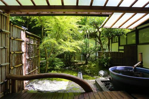 Open air bath, Momijiya Bekkan Kawa No Iori Ryokan in Ukyo