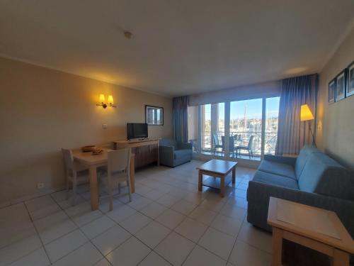 Shared lounge/TV area, CAP HERMES Studio 31m2 Vue Port Climatise piscine, near Garden Ice Cafe