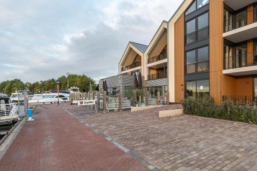 Entrance, Luxe en comfortabel appartement aan het water in Kamperland