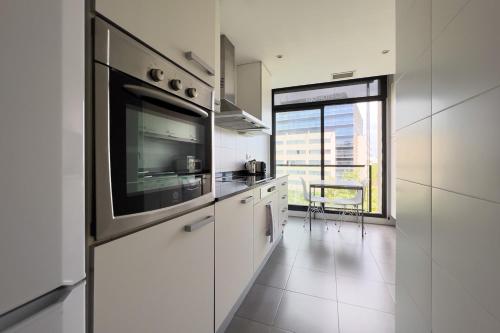 廚房, chicStays Apartment Ciutadella Park in 奧林匹克別墅