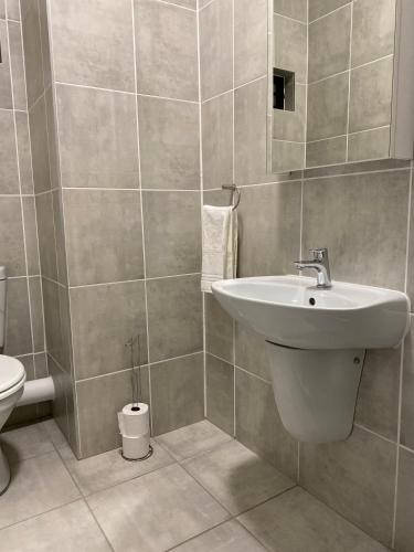 Bathroom, Outer Space - 1 bedroom Luxurious Apartment in Sandton in Lethabong