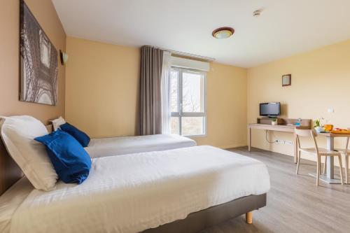Zenitude Hôtel-Résidences Magny-les-Hameaux - image 4