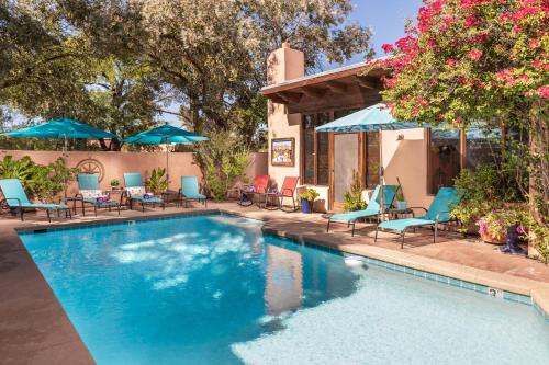 Adobe Rose Inn near สวนสัตว์รีดพาร์ค