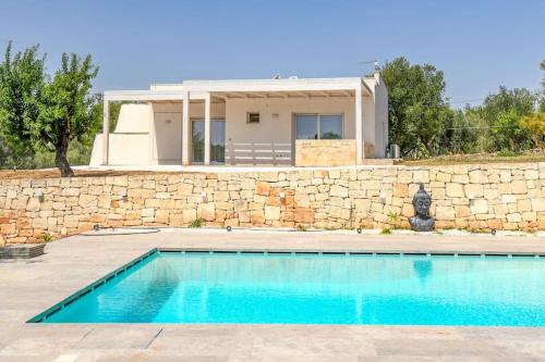 Trullo Strangio by Raro Villas - Tap to explore photos