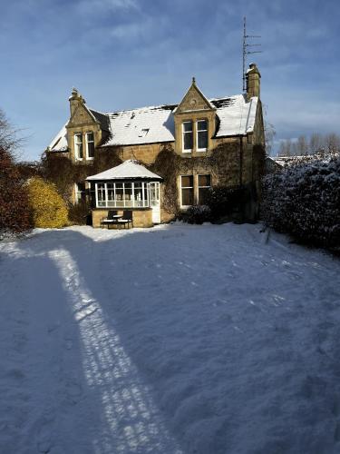 Сад, St Duthus Villa Guesthouse in Тейн