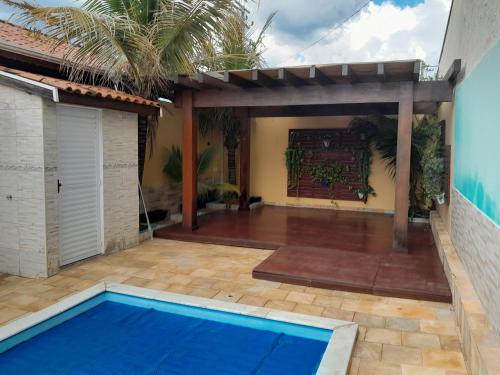 Casa familiar 3 Dorm com Piscina e churrasqueira