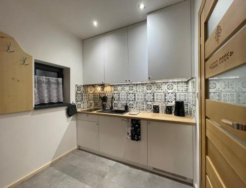 Domki przy skwerku in Guty