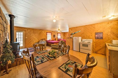 The Burgundy Cabin Iowa Retreat Pond and Fire Pit in Spragueville, USA