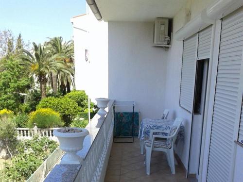 lovely apartments near the town of Rab with Children's pool, playground, garden, parking lot, grill, terraces,