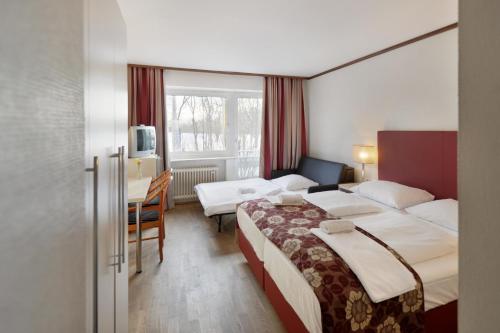 Ambassador Parkhotel Room Type - Triple Room Ambassador Parkhotel Room Type - Triple Room