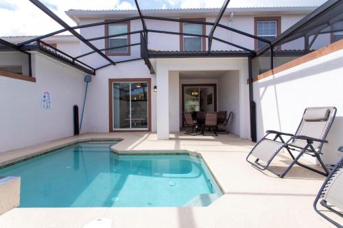 Stunning Four Bedroom w/ Screened Pool Close to Disney 1559 - main image