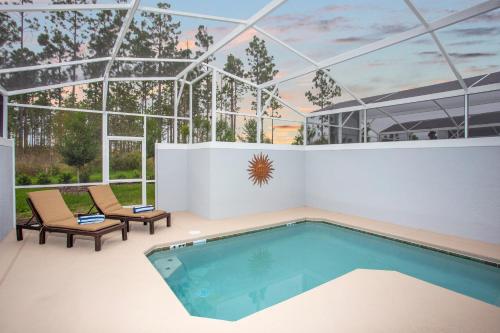 Marvelous 4 Bd w/ Pool Close to Disney 218 - image 6