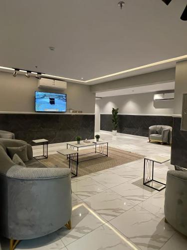 Shared lounge/TV area, sky hotel in Al Ula