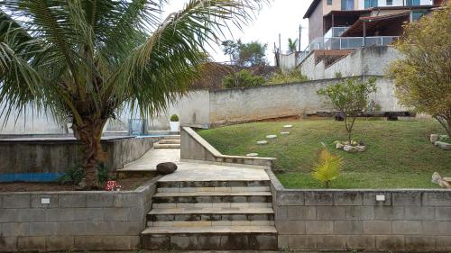 Espaço familiar com piscina em Penedo