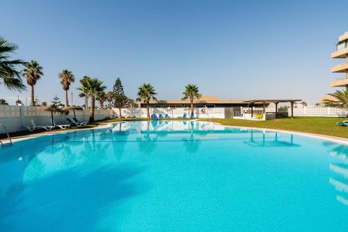Tres bel apartamento primera linea de Playa Serena - image 3
