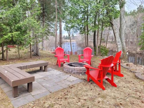 . Whispering Pines Riverside Retreat