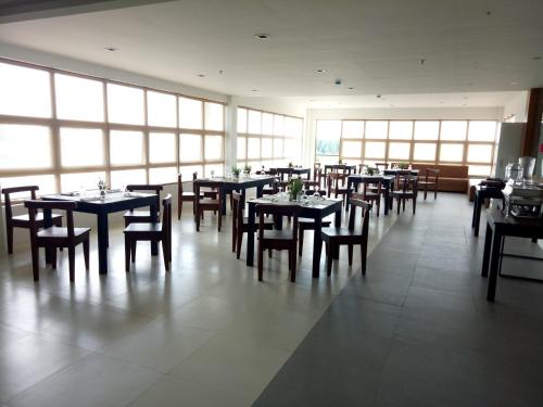 Restaurant, Crown Harbour Springs Managed By Enderun Hotels near Lu-Li Island