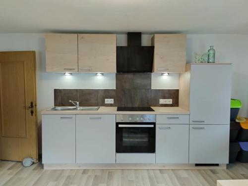 virtuve, Haus Heimat & Appartement in Langenfelda