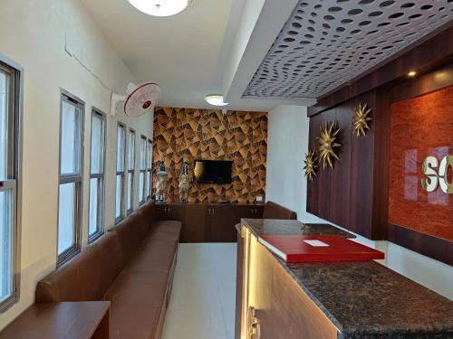 ห้องส่วนกลางสำหรับนั่งเล่น/ดูทีวี, Hotel Soneva Inn in บาเรียตู