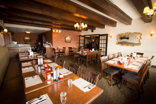 餐廳, 溫德姆旗下-德拉蒙德維爾旅客之家酒店 (Travelodge by Wyndham Drummondville) in 德拉蒙德維爾