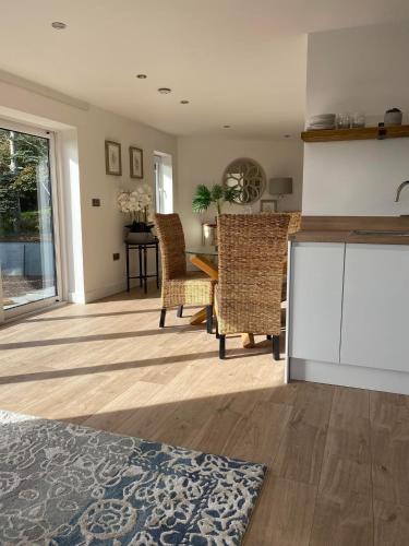 Studio Cabin Retreat with Hot Tub Sea and Downs views in Seaford with own garden in Seaforde
