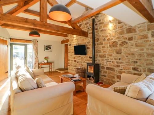 Viesnīcas āriene, The Byre, Sedbury Park Farm in Gilling West
