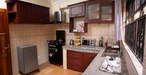מטבח, Karay Apartments in Wakiso אזור מטרופוליני