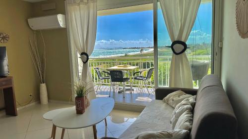 Rêves de Tropiques - Grands studios avec piscine vue océan accès plage direct - Location saisonnière - Cul de Sac