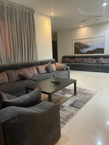 Al-Aniqa Furnished Apartments - Tap to explore photos