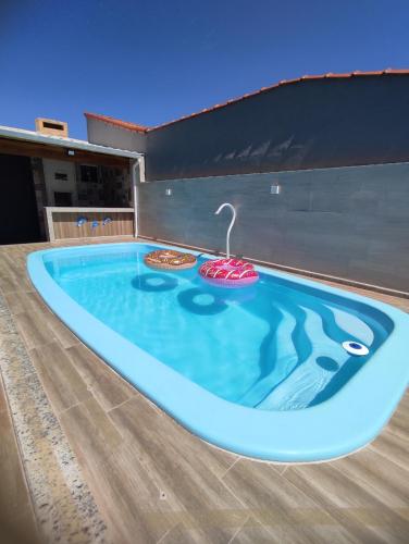 Casa de Praia com Piscina por Temporada Orla 500 Unamar Cabo Frio RJ