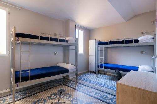 Purple Nest Hostel Room Type - Single Bed in 4-Bed Mixed Dormitory Room